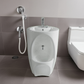 white wudu wash basin in a bathroom next to urinal